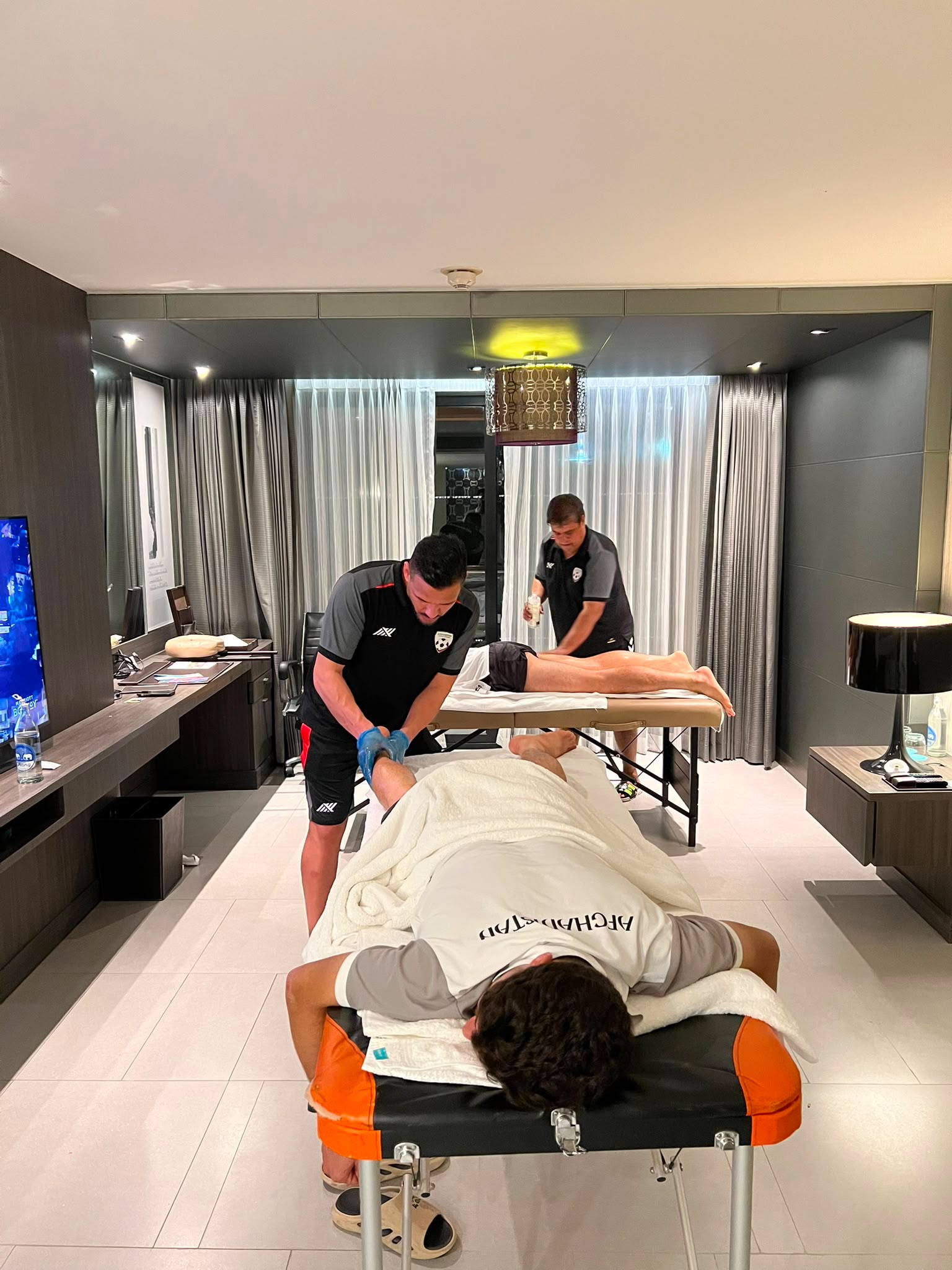 Mobile physiotherapy dispatched to a luxury hotel suite with two treatment tables